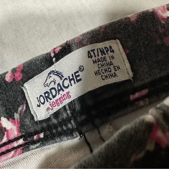 1 Jordache black with flowers jeggings and 1 pair of Cat and Jack teal jeans. - Picture 6 of 6